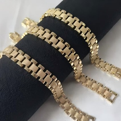 Gold watch-link bracelets in slim and wide widths
